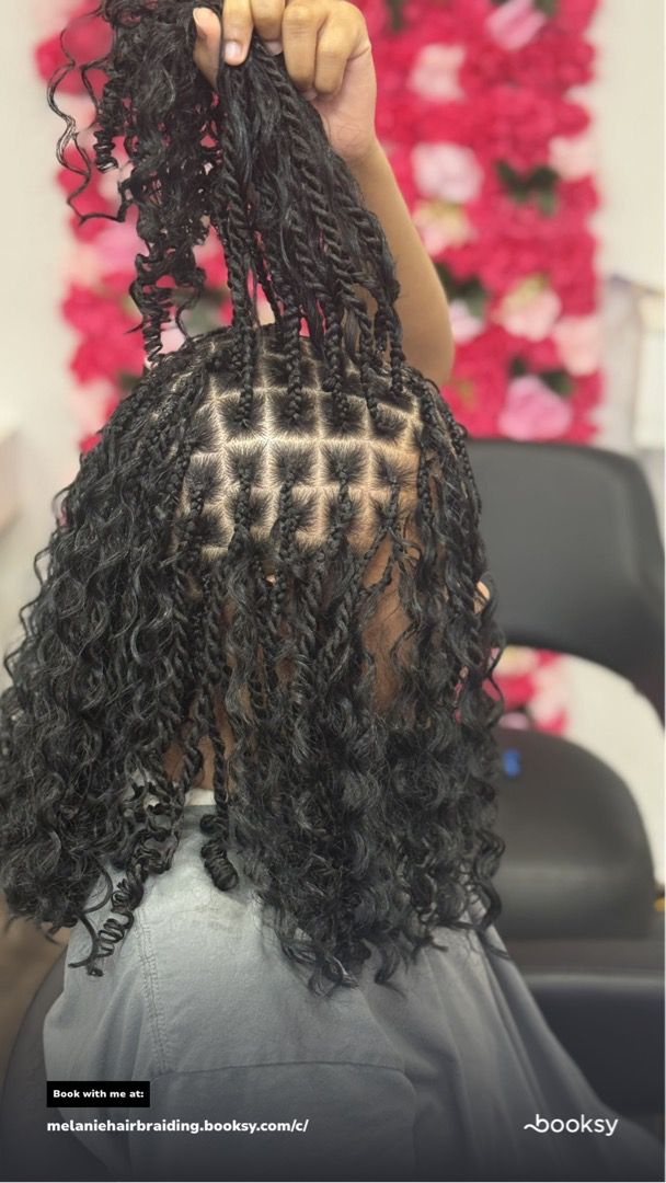 Professional hair braiding specialist at Melanie Hair Braiding
